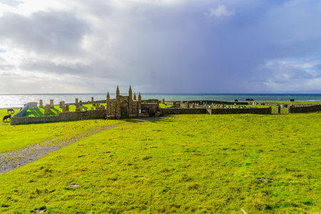 View of the Cladh nam Paitean old cemetery, in the Kintyre peninsula, Scotland, UKの写真素材