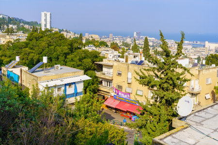 Haifa, Israel - December 23, 2022: View of urban landscape with the downtown and the Mediterranean Sea, in Hadar HaCarmel neighborhood, Haifa, Israelのeditorial素材
