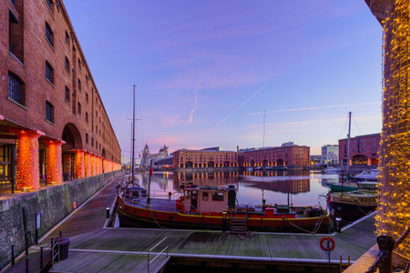 Liverpool, UK - October 09, 2022: Sunrise view of the Royal Albert Dock, with various buildings, in Liverpool, Merseyside, England, UKのeditorial素材