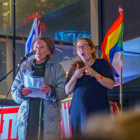 Haifa, Israel - March 18, 2023: Activist Hadassah Froman speak to the crowd during a protest demonstration in Haifa, Israelのeditorial素材