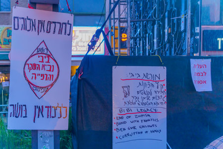 Haifa, Israel - March 18, 2023: Protest signs in a demonstration against the plans of the new government, claiming its anti-democratic, in Haifa, Israelのeditorial素材