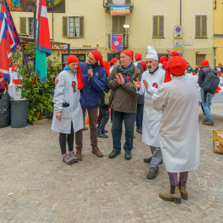Ivrea, Italy - February 19, 2023: Participant are celebrating, part of the historical carnival of Ivrea, Piedmont, Northern Italyのeditorial素材