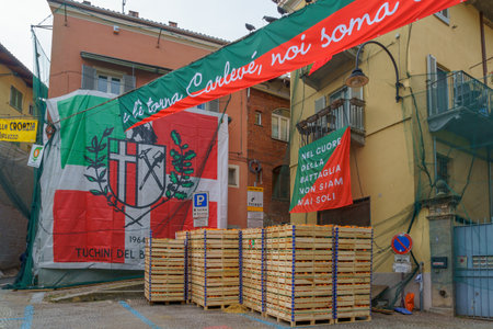 Ivrea, Italy - February 19, 2023: Oranges boxes and protection nets, preparation for the battle of the oranges, part of the historical carnival of Ivrea, Piedmont, Northern Italyのeditorial素材