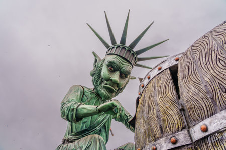Crema, Italy - February 26, 2023: Carnival parade, with allegorical figure wagon, and crowd, in Crema, Lombardy, Northern Italyのeditorial素材
