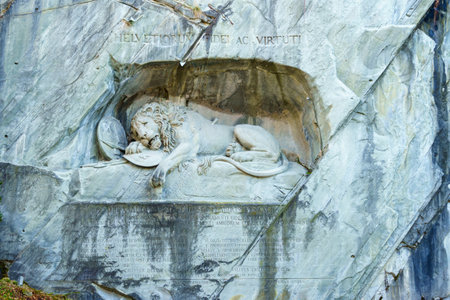 Lucerne, Switzerland - February 21, 2023:View of the Lion Monument (Lowendenkmal), commemorates the Swiss Guards who were massacred in 1792 during the French Revolution. Lucerne (Luzern), Switzerlandのeditorial素材