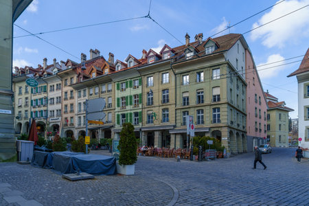 Bern, Switzerland - February 23, 2023: Street view of with various buildings, locals and visitors, in Bern, Switzerlandのeditorial素材