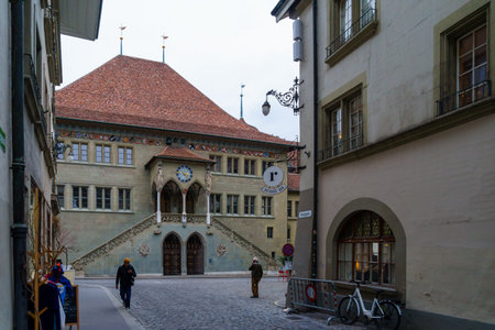 Bern, Switzerland - February 22, 2023: View of the City Hall Building (Berner Rathaus), with locals, and visitors, in Bern, Switzerlandのeditorial素材