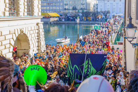 Lucerne, Switzerland - February 20, 2023: Band of musicians in costumes play to the crowd, part of the Fasnacht Carnival, in Lucerne (Luzern), Switzerlandのeditorial素材