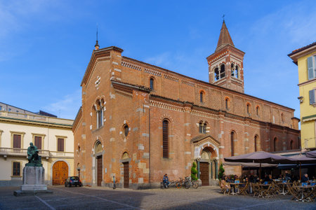 Monza, Italy - February 25, 2023: View of the San Pietro Martire church, with its piazza and visitors, in Monza, Lombardy, Northern Italyのeditorial素材