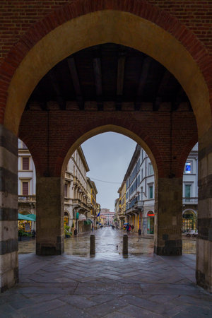 Monza, Italy - February 25, 2023: View of the Arengario palace, with its piazza, nearby street, and visitors, in Monza, Lombardy, Northern Italyのeditorial素材
