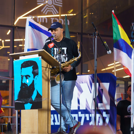 Haifa, Israel - May 06, 2023: Protester (Yoram Buskila) speaks to the crowd in a protest against the plans of the new government, claiming its anti-democratic, in Haifa, Israelのeditorial素材