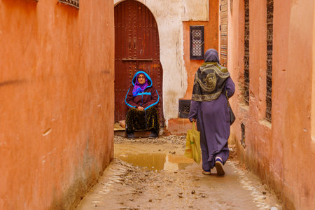 Marrakesh, Morocco - April 05, 2023: Street scene with locals, and visitors, in the Medina of Marrakesh, Moroccoのeditorial素材