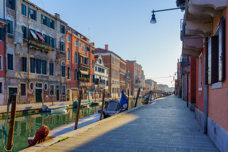 View of the Rio de San Girolamo Canal, with boats, houses, and bridges, in Venice, Veneto, Northern Italyの写真素材