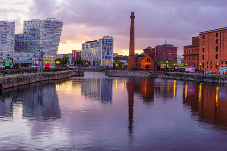 Liverpool, UK - October 08, 2022: Sunrise view of the Royal Albert Dock, with various buildings, in Liverpool, Merseyside, England, UKのeditorial素材
