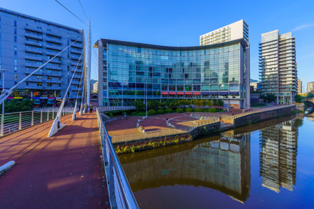 Manchester UK - October 08, 2022: Scene of the River Irwell and the Trinity Bridge, with locals, and visitors, in Manchester, England, UKのeditorial素材