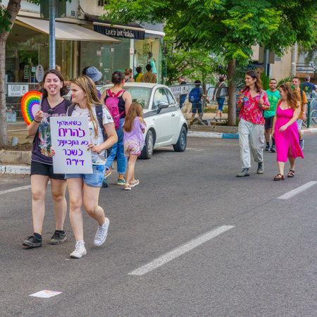 Haifa, Israel - June 15, 2023: View of participants marching with various signs, in the annual Pride Parade of the LGBTQ+ community, in Haifa, Israelのeditorial素材