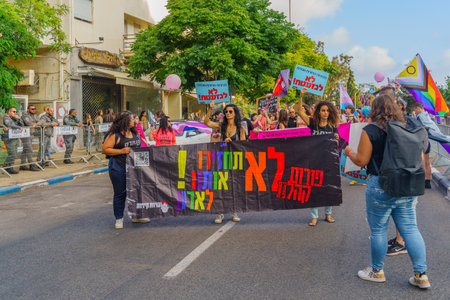 Haifa, Israel - June 15, 2023: View of participants marching with various protest signs, in the annual Pride Parade of the LGBTQ+ community, in Haifa, Israelのeditorial素材