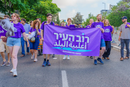Haifa, Israel - June 15, 2023: View of participants marching with various signs, in the annual Pride Parade of the LGBTQ+ community, in Haifa, Israelのeditorial素材