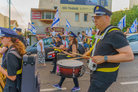 Haifa, Israel - July 08, 2023: People perform anti dictatorship display. Week 27 of anti-government protest in Haifa, Israelのeditorial素材
