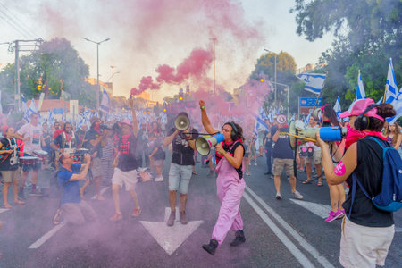 Haifa, Israel - July 15, 2023: Circle of young protesters. Part of week 28 of protest against controversial judicial overhaul. Haifa, Israelのeditorial素材