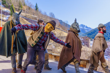 Valfloriana, Italy - February 26, 2022: Carnival participant reenacting local events, in the Valfloriana carnival, Trentino, Northern Italyのeditorial素材