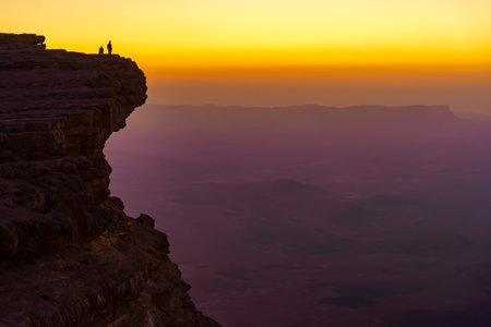 Sunrise view of Makhtesh (crater) Ramon, in the Negev Desert, Southern Israel. It is a geological landform of a large erosion cirqueの写真素材