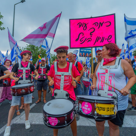 Haifa, Israel - August 19, 2023: Protest march lead by the Pink front. Week 33 of protest against controversial judicial overhaul. Haifa, Israelのeditorial素材