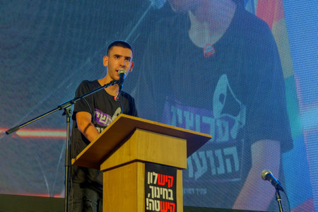Haifa, Israel - September 02, 2023: Youth protest leader Niv Williams speaks to the crowd. Week 35 of protest against controversial judicial overhaul. Haifa, Israelのeditorial素材