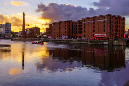 Liverpool, UK - October 08, 2022: Sunrise view of the Royal Albert Dock, with various buildings, in Liverpool, Merseyside, England, UKのeditorial素材