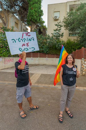 Haifa, Israel - September 09, 2023: People march with anti-occupation signs. Week 36 of protest against controversial judicial overhaul. Haifa, Israelのeditorial素材