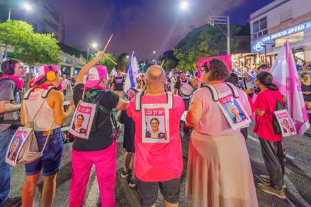 Haifa, Israel - September 09, 2023: People protest with backing up the Attorney General signs. Week 36 of protest against controversial judicial overhaul. Haifa, Israelのeditorial素材