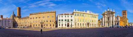 Mantua, Italy - February 28, 2023: Panoramic view of the Piazza Sordello, with local monuments and businesses, locals, and visitors, in Mantua (Mantova), Lombardy, Northern Italyのeditorial素材