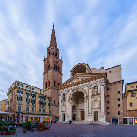 Mantua, Italy - February 27, 2023: View of the Piazza Andrea Mantegna, and the Basilica di SantAndrea, with local businesses, in Mantua (Mantova), Lombardy, Northern Italyのeditorial素材