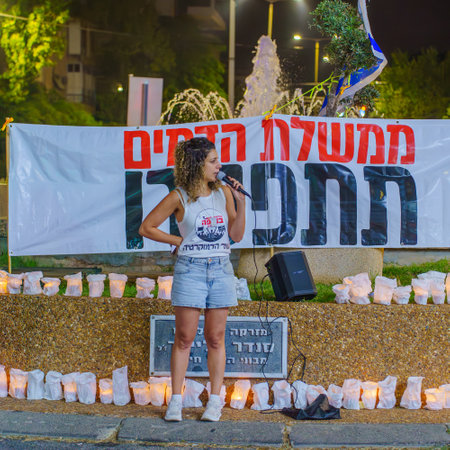 Haifa, Israel - November 04, 2023: People give a speech, in an assembly of solidarity with the hostages kidnapped to Gaza and protest against the government. Haifa, Israelのeditorial素材