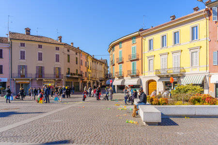 Crema, Italy - February 27, 2022: Scene of Piazza Garibaldi square, with locals and visitors, in Crema, Lombardy, Northern Italyのeditorial素材