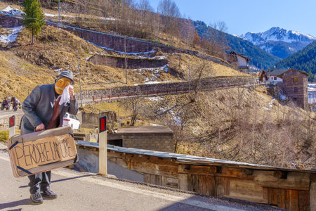 Valfloriana, Italy - February 26, 2022: Carnival participant in a traditional costume, in the Valfloriana carnival, Trentino, Northern Italyのeditorial素材