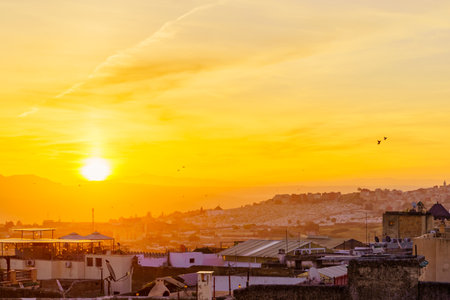 Rooftop view at sunrise, of the old Medina of Fes, Moroccoの写真素材