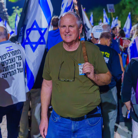 Caesarea, Israel - November 11, 2023: People protest against the prime minister Benjamin Netanyahu, calling for taking responsibility and resign. Caesarea, Israelのeditorial素材