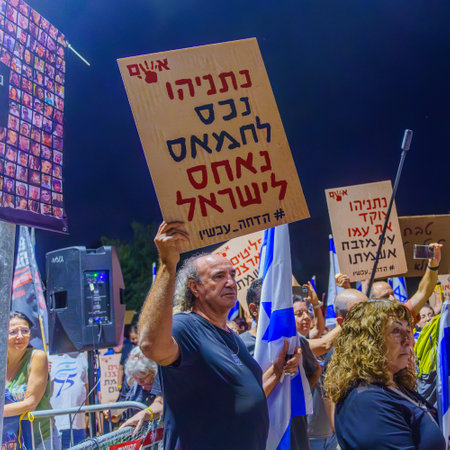 Caesarea, Israel - November 11, 2023: People protest against the prime minister Benjamin Netanyahu, calling for taking responsibility and resign. Caesarea, Israelのeditorial素材