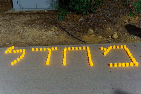 Caesarea, Israel - November 11, 2023: The word failure written with candles, part of a protest against the government. Caesarea, Israelのeditorial素材