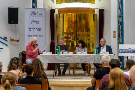 Haifa, Israel - November 14, 2023: Journalist Micha Fridman, Yair Golan, Gal Hod Krontal and Yossi Triest, in a meeting about leadership in war time. Haifa, Israelのeditorial素材