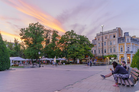 Ruse, Bulgaria - September 17, 2023: Sunset view of the central square, with locals, and visitors,...