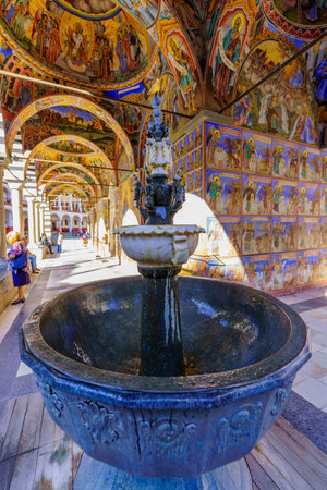 Rila, Bulgaria - October 07, 2023: View of the Main church Baptismal font in the Rila Monastery (Monastery of Saint John of Rila), with visitors. Bulgariaのeditorial素材
