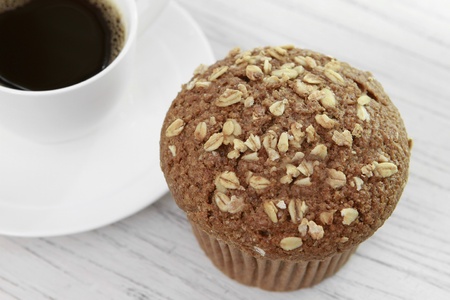 Oat bran muffin and coffeeの写真素材