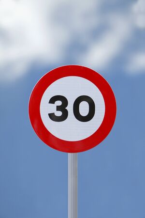 Speed limit road sign with a soft sky backgroundの写真素材