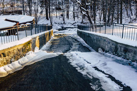 Calm Winter Photo of a River in a Park on a Sunny Dayの写真素材
