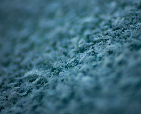 Closeup of a Snowflakes on a Car Windshield with Blurred Foreground - textureの写真素材