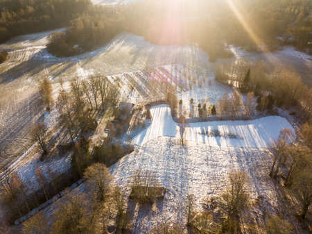 Aerial Photography of a Countryside Fields in a Sunny Winter Dayの写真素材