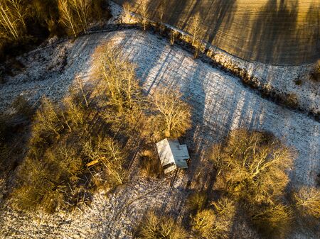 Aerial Photography of a Countryside Fields in a Sunny Winter Dayの写真素材