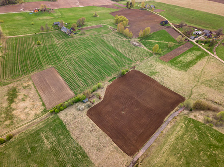 Drone Photo of the Countryside Fields in Colorful Early Spring Day - Top Down Viewの写真素材
